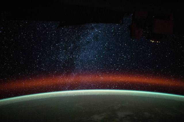 The Milky Way is pictured above Earth's atmospheric glow