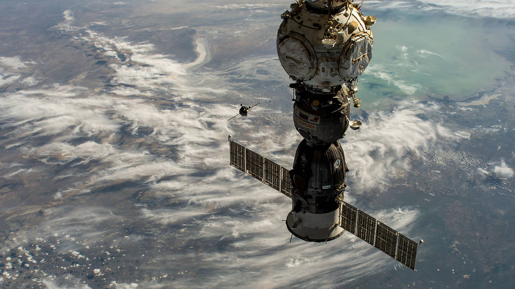The Progress 81 cargo craft approaches the International Space Station