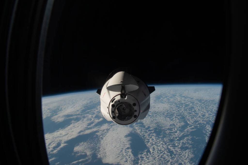 The SpaceX Dragon resupply ship approaches the space station
