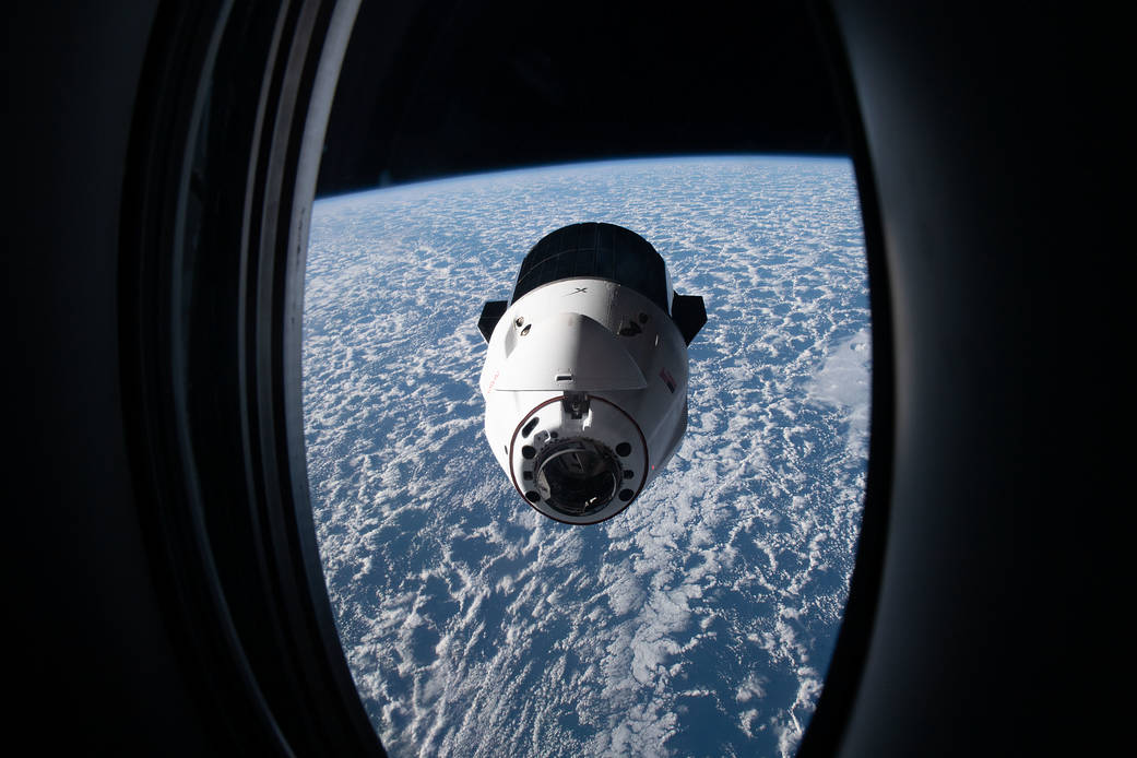 The SpaceX Dragon resupply ship approaches the space station