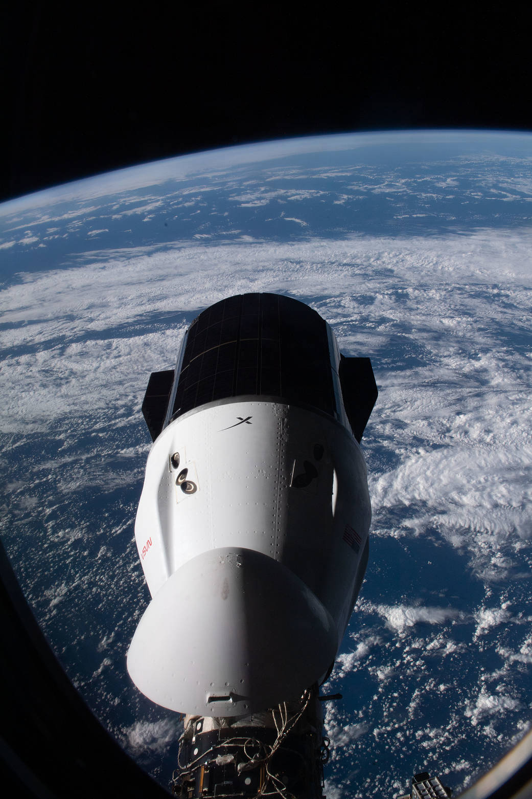 The SpaceX Dragon resupply ship docked to the space station