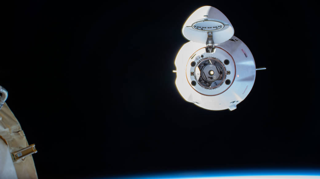 The SpaceX Dragon resupply ship approaches the space station