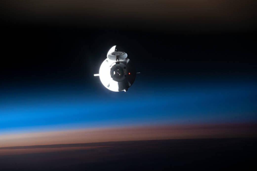 The SpaceX Dragon space freighter approaches the space station