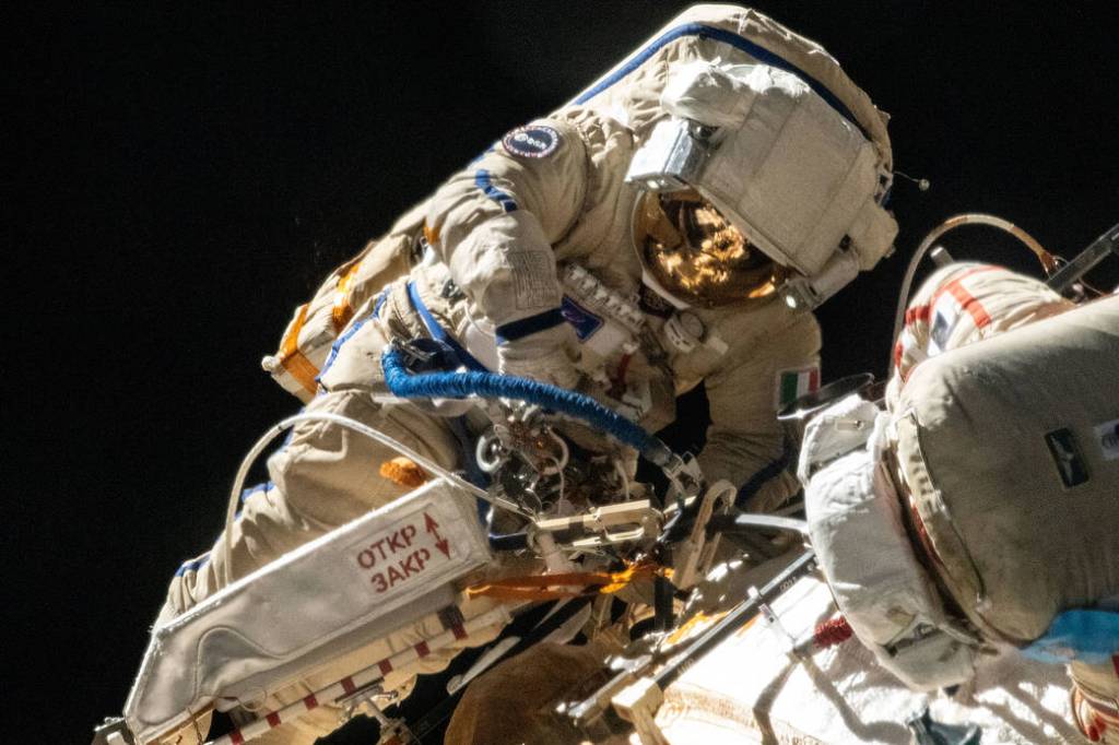 Spacewalker Samantha Cristoforetti works outside the Nauka module
