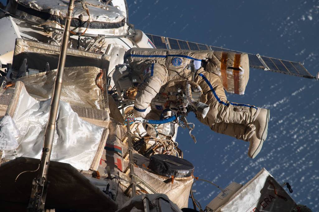 Spacewalker Samantha Cristoforetti works outside the Nauka module