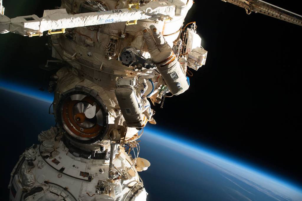 Spacewalkers Samantha Cristoforetti and Oleg Artemyev work outside Nauka