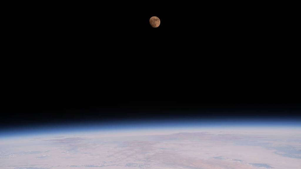 The waxing gibbous Moon above the northern Pacific Ocean