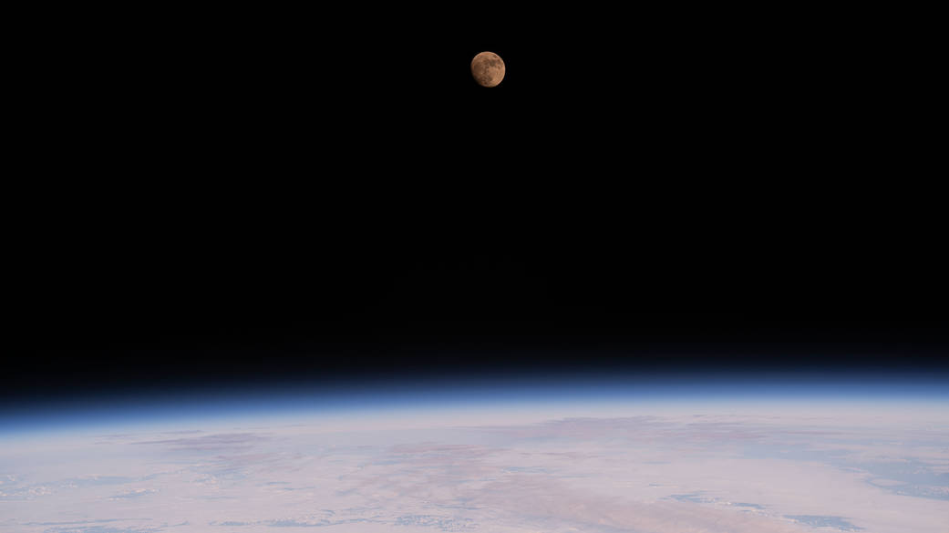 The waxing gibbous Moon above the northern Pacific Ocean