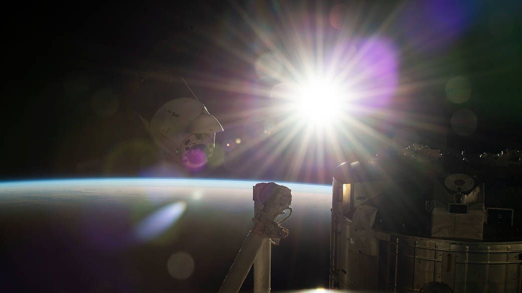 The SpaceX Dragon resupply ship backs away from the space station