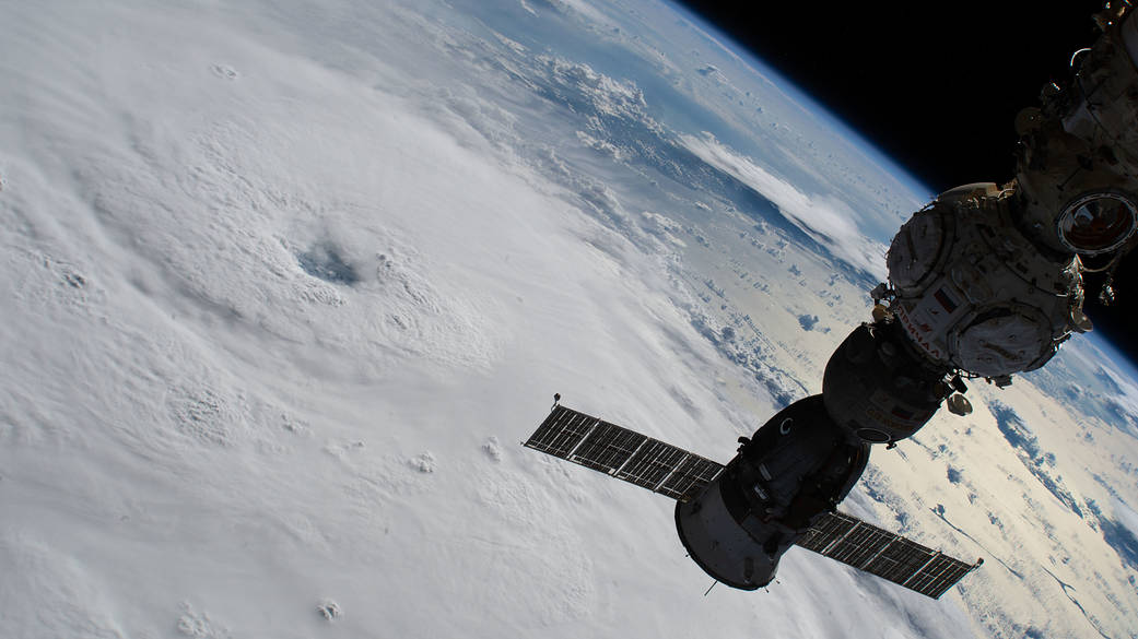 Hurricane Fiona is pictured below the International Space Station