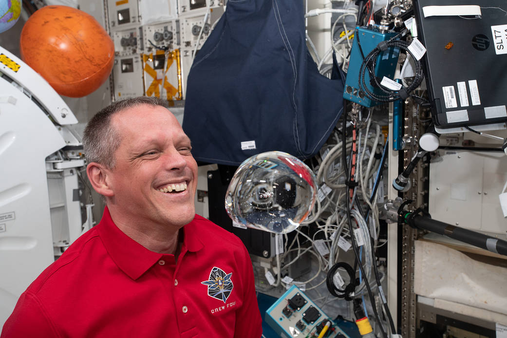 Astronaut Bob Hines has fun with fluid physics