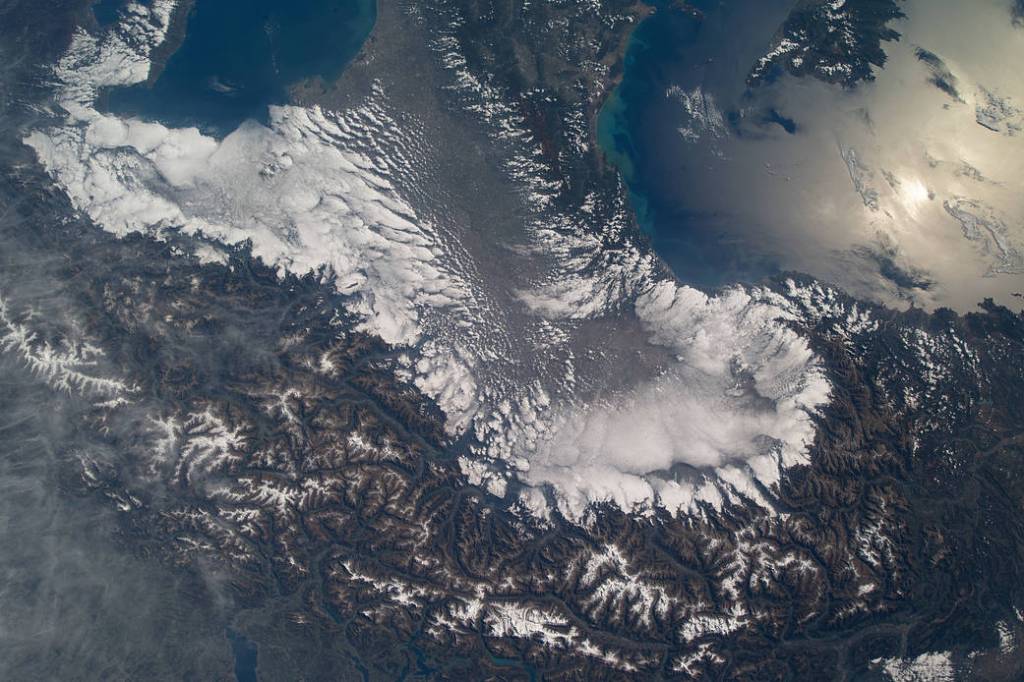 The Swiss Alps surround Northern Italy’s Po Valley region