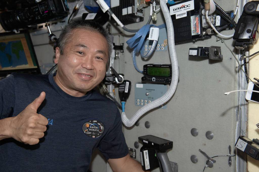 Astronaut Koichi Wakata gives a “thumbs up” sign