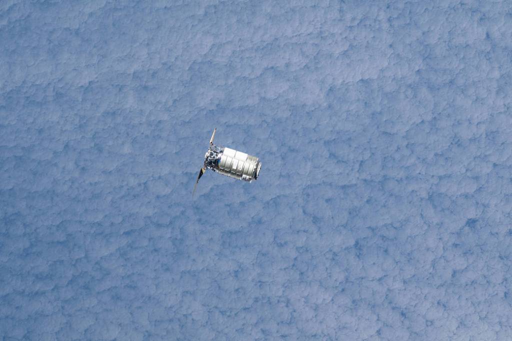 The Cygnus space freighter approaches the space station