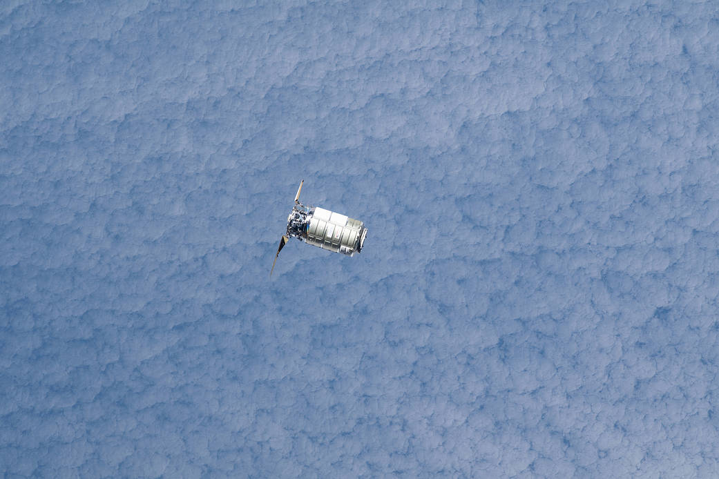 The Cygnus space freighter approaches the space station