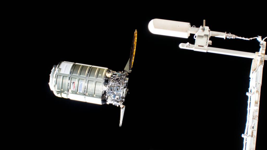 The Cygnus space freighter approaches the space station