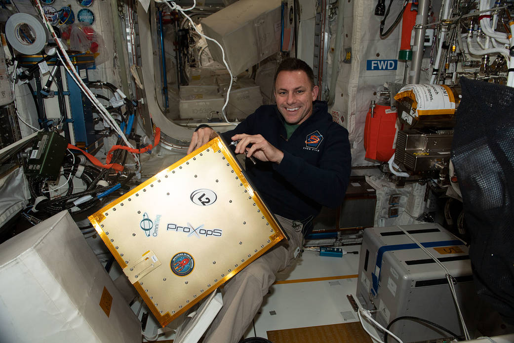 Astronaut Josh Cassada works on cargo transfers
