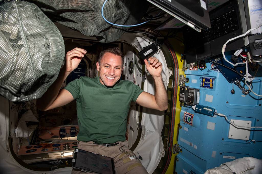 Astronaut Josh Cassada works inside the Quest airlock