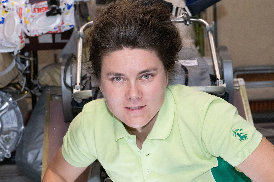 Cosmonaut Anna Kikina works on electronics maintenance