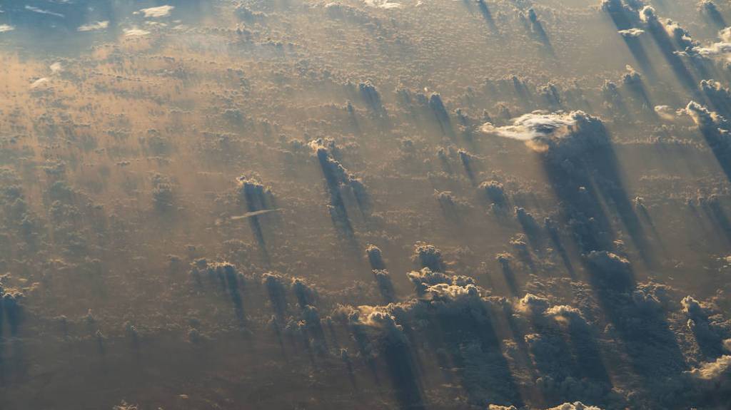 A sunset stretches cloud shadows over Tanzania