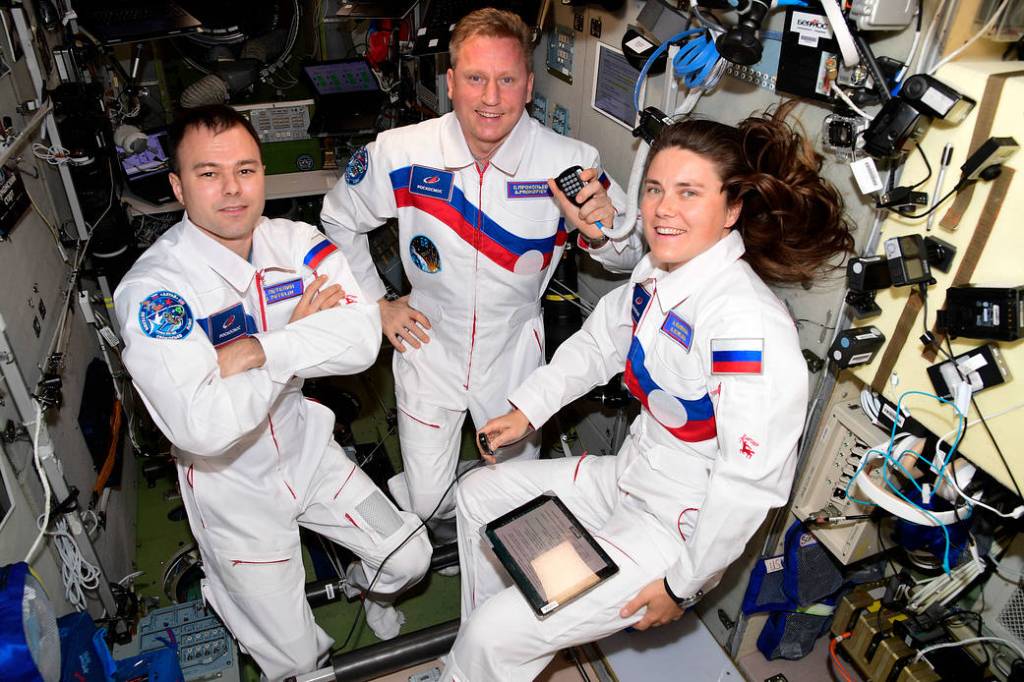 Expedition 68 crew members in the Zvezda service module