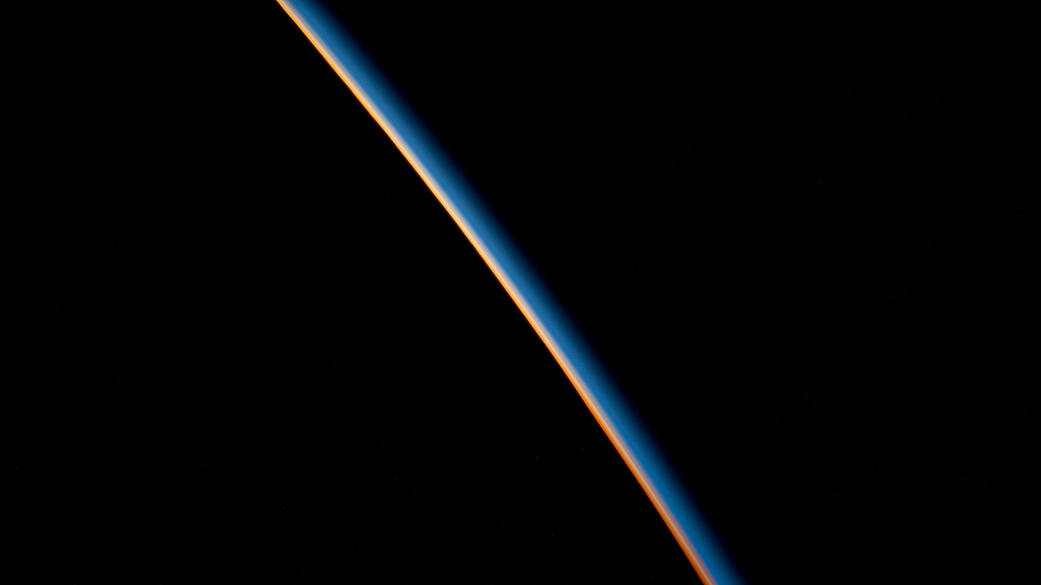 The last rays of an orbital sunset illuminate the Earth's atmosphere in this photograph from the International Space Station as it orbited 269 miles above the Atlantic Ocean off the coast Argentina.