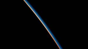 The last rays of an orbital sunset illuminate the Earth's atmosphere in this photograph from the International Space Station as it orbited 269 miles above the Atlantic Ocean off the coast Argentina.