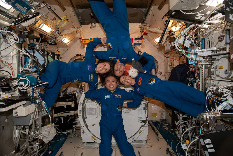 Clockwise from left, Expedition 68 flight engineers Anna Kikina, Josh Cassada, Nicole Mann, and Koichi Wakata pose for a fun portrait aboard the International Space Station. The quartet is planning on returning to Earth this month. 