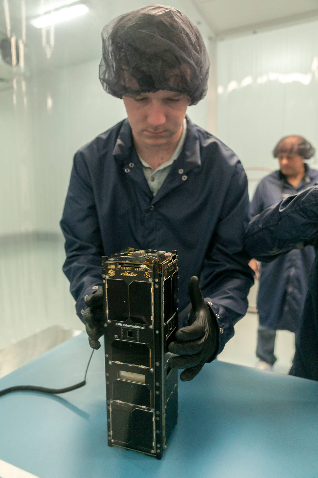 The Ionospheric Scintillation Explorer (ISX) is prepared for launch.