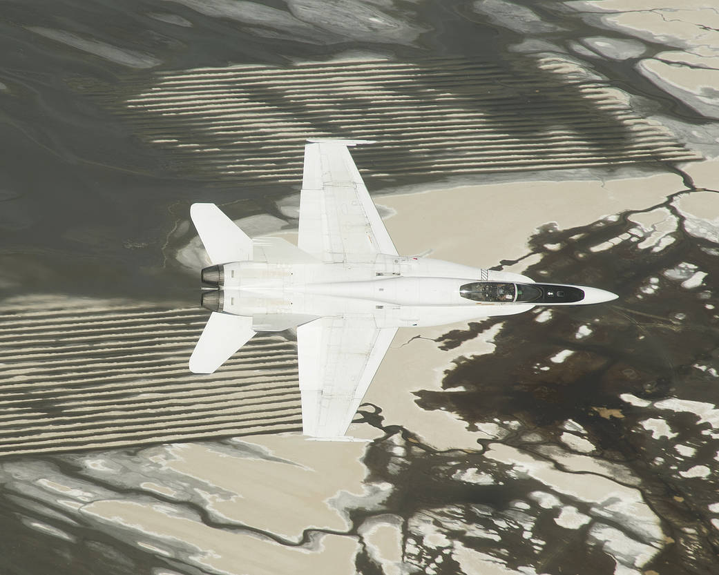 F/A-18 #843 in low-level formation flight.