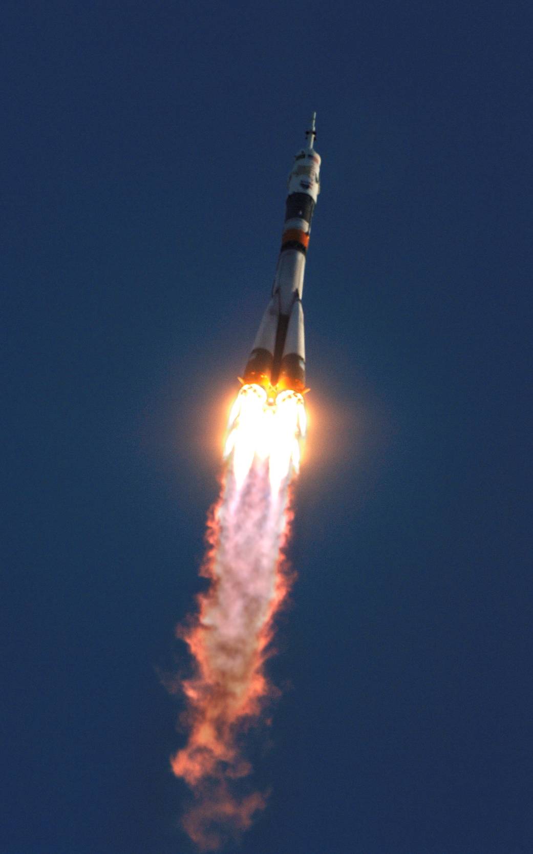 Soyuz rocket streaks upward toward space just after launch