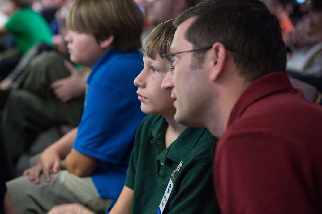 Father and Student Watch Cygnus Launch