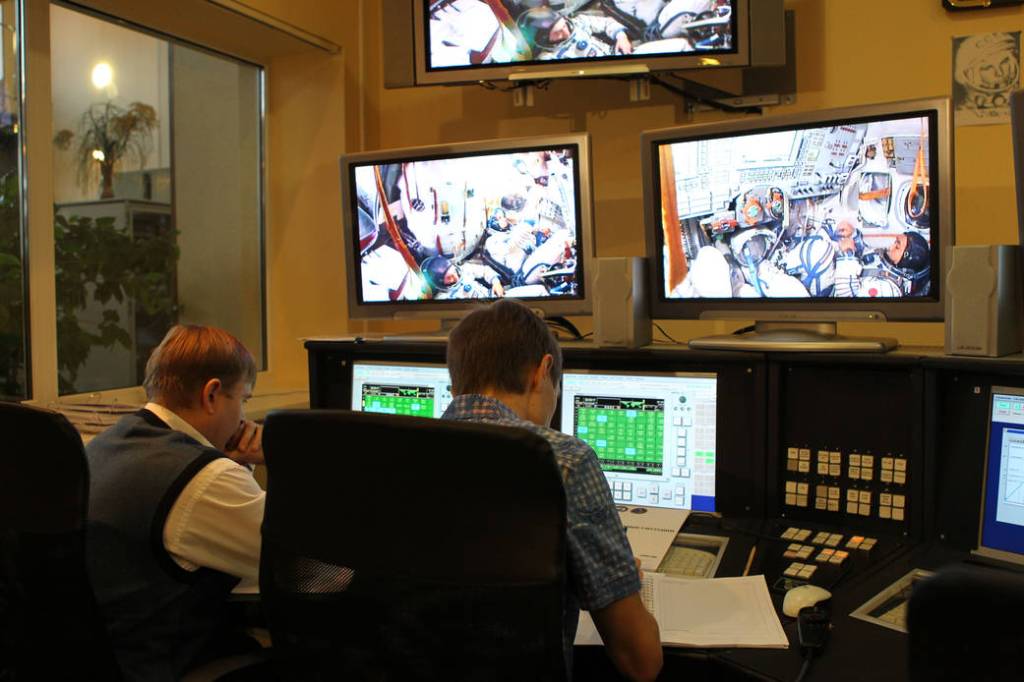 Trainers Monitor a Simulation Run