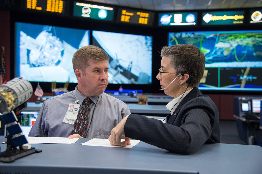 Flight Director Courtenay McMillan and flight controller Troy McCracken
