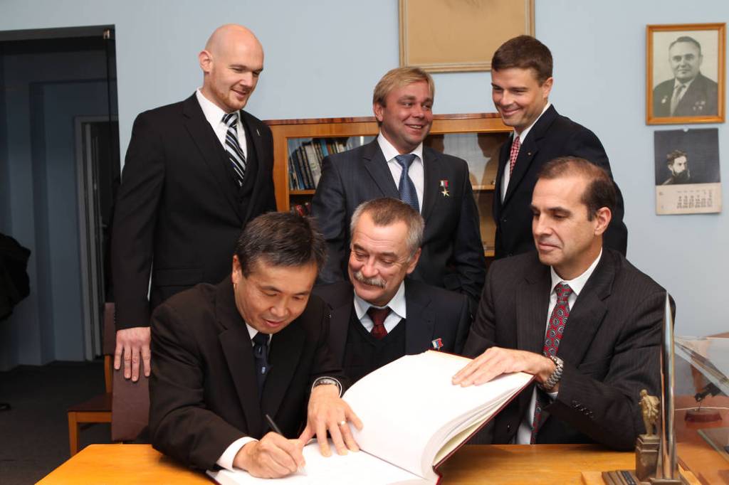 Astronaut Koichi Wakata Signs Commemorative Book