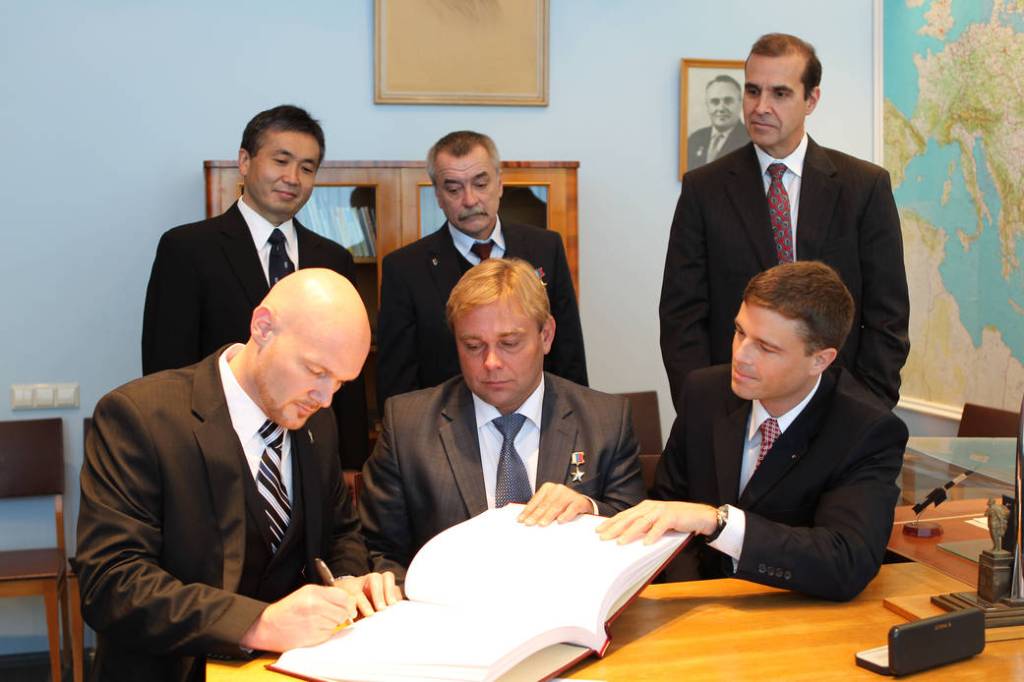 Astronaut Alexander Gerst Signs Commemorative Book