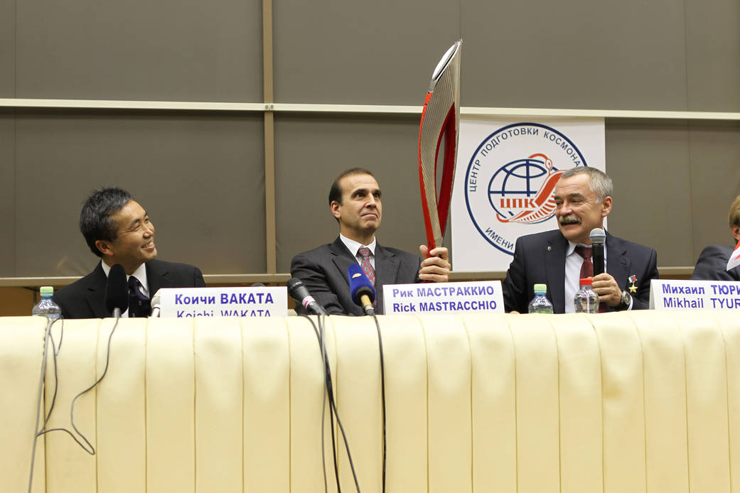 Astronaut Rick Mastracchio With Model of Olympic Torch