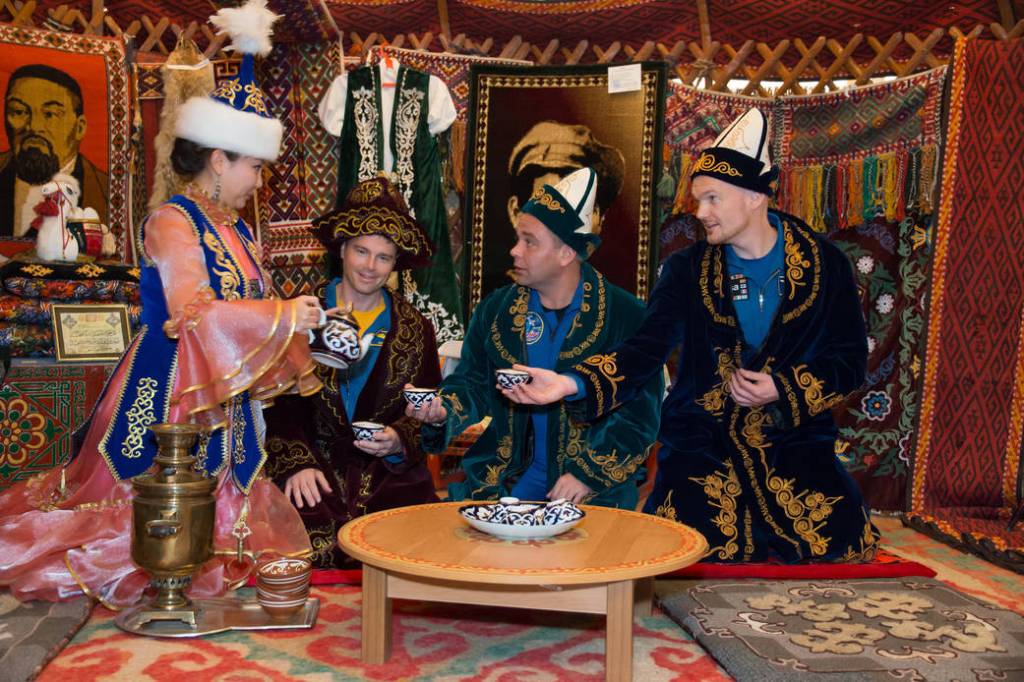 Expedition 38/39 backup crew members participate in a traditional meal