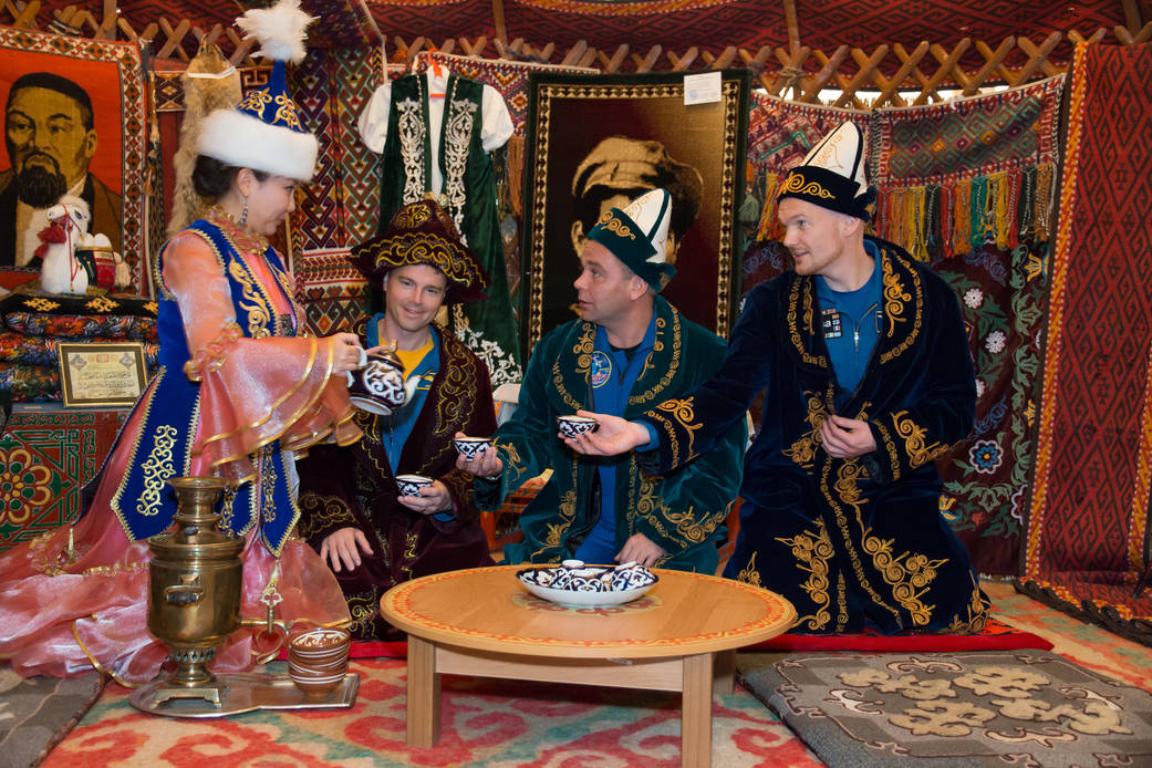 Expedition 38/39 backup crew members participate in a traditional meal