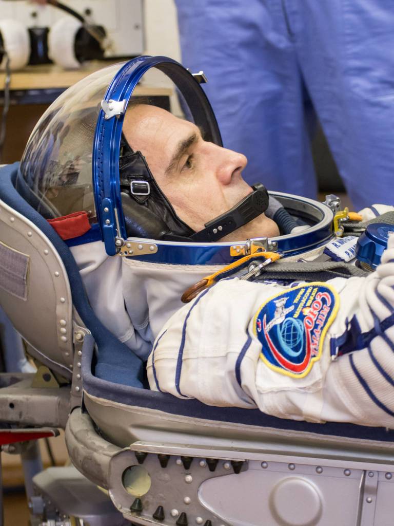 Rick Mastracchio conducts a leak check of his Russian Sokol launch and entry suit