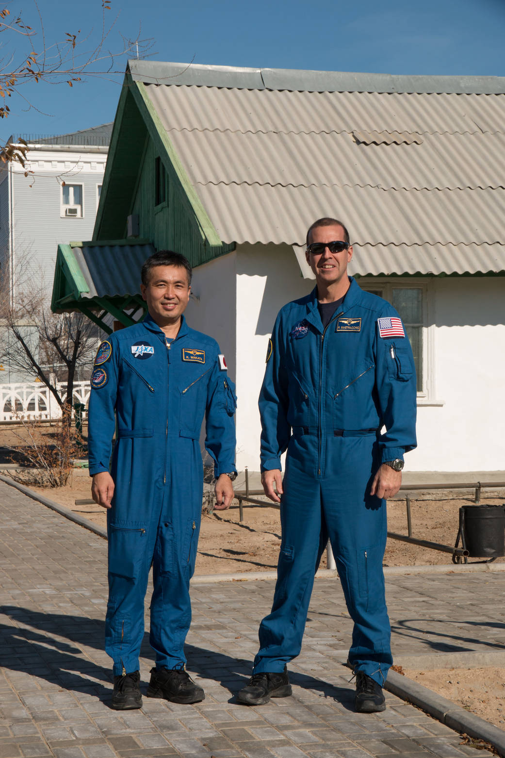Koichi Wakata and Rick Mastracchio in front of the famed cottage that Yuri Gagarin slept in on the eve of his launch April 12, 1