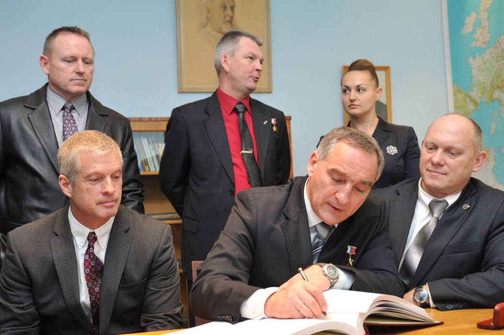 Soyuz Commander Alexander Skvortsov Signs Commemorative Book