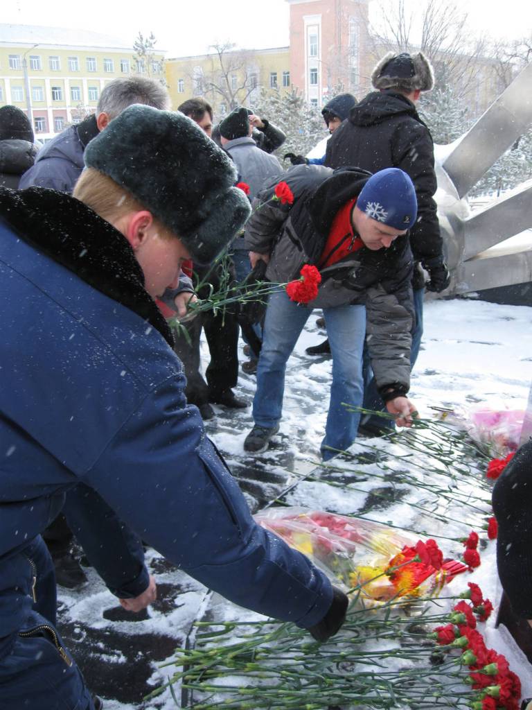 Laying Flowers at Yuri Gagarin Statue