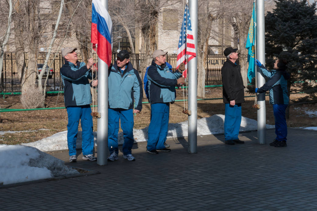 Expedition 39/40 Crew Members Raise the Flags
