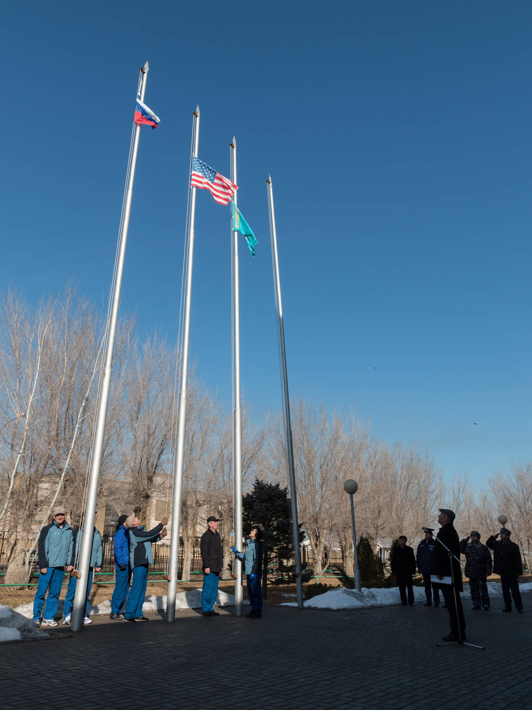 The Flags of Russia, the United States and Kazakhstan Fly High