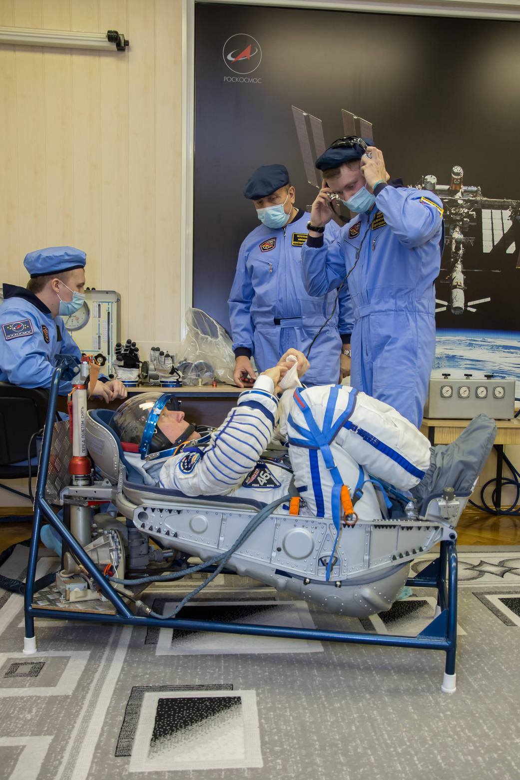 Tim Kopra of NASA Conducts a Pressure and Leak Check