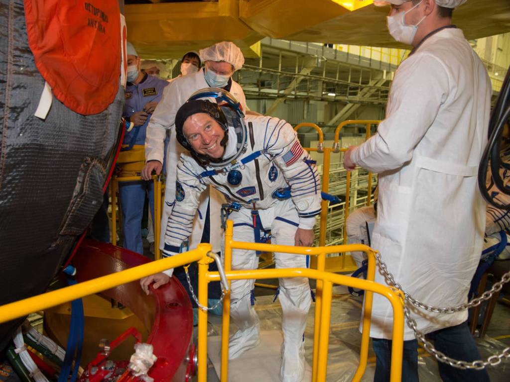 Tim Kopra of NASA Waits to Board the Soyuz TMA-19M Spacecraft
