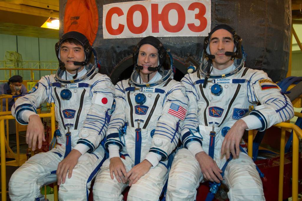 Expedition 46-47 Backup Crew Members in Front of the Soyuz TMA-19M Spacecraft