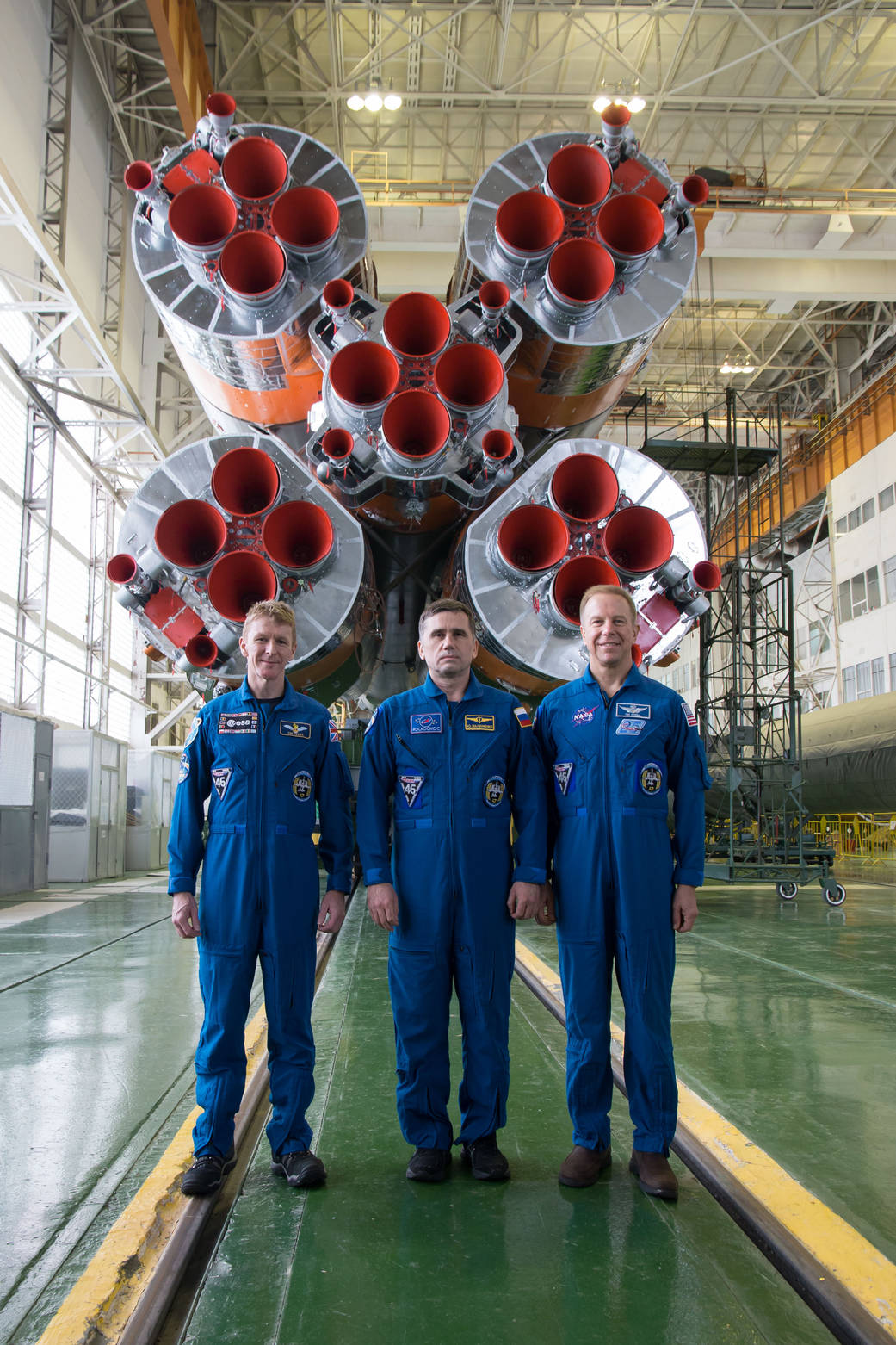 Expedition 46-47 Crew Members In Front of Soyuz Rocket