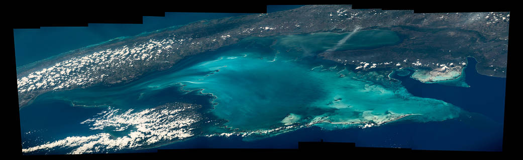 Composite image of blue waters and land of Cuba photographed from low Earth orbit